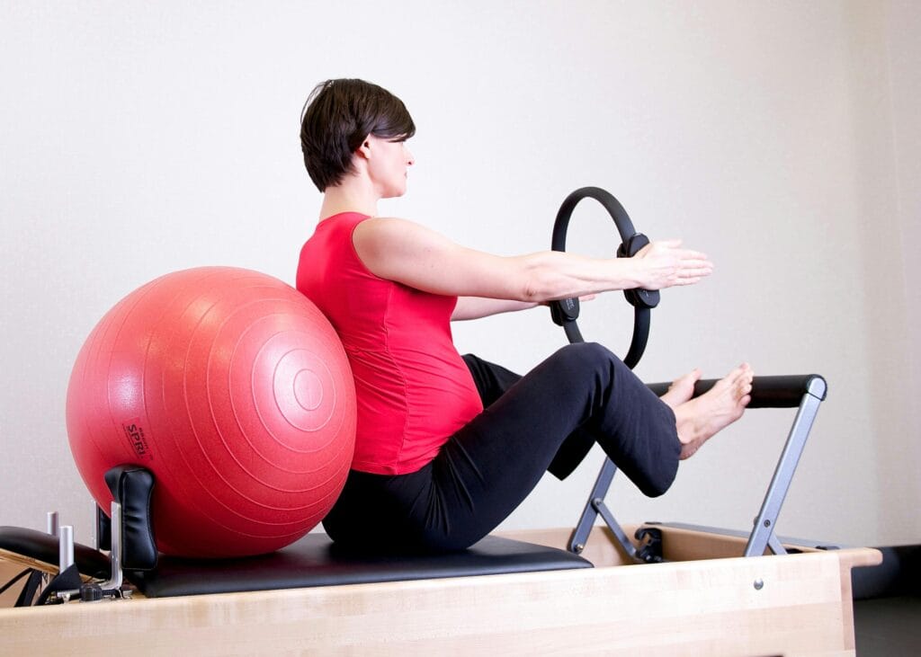 30 Day Fitness Challenge 4 | eat move healthy woman-Pilates exercise-with-reformer-stability-ball.