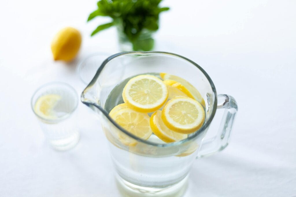 7-Day Reset Plan 3 | eat move healthy lemon slices in a glass water