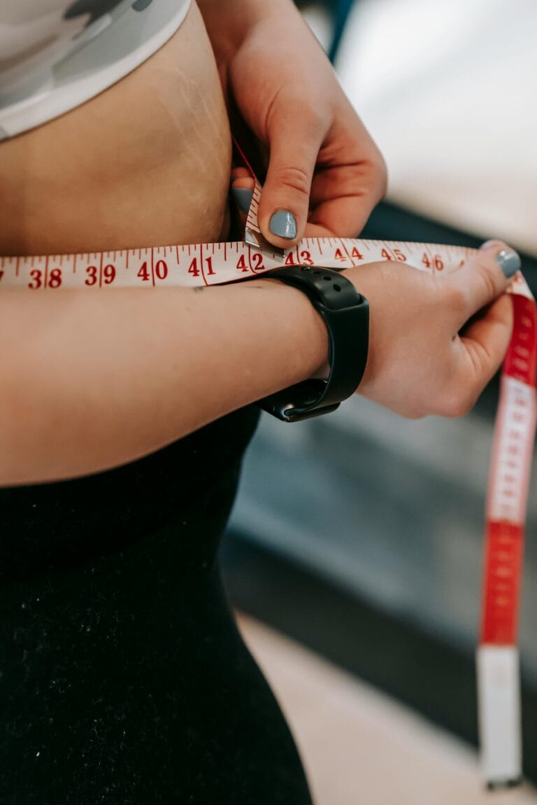 30 Day Fitness Challenge 10 | eat move healthy measuring tape for waist, hips, arms, and legs