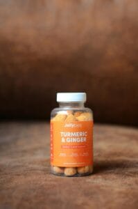 10 Surprising Health Facts You’ve Never Heard 5 | eat move healthy Bottle of Jellybee turmeric and ginger gummies promoting health and immunity with orange flavor.