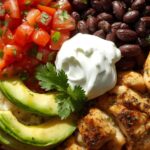 Low-Carb-Chicken-Burrito-Bowl__Grilled-chicken-cauliflower-rice-avocado-salsa-and-black-beans-with-greek-yogurt-on-top