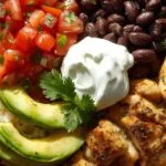 Low-Carb-Chicken-Burrito-Bowl__Grilled-chicken-cauliflower-rice-avocado-salsa-and-black-beans-with-greek-yogurt-on-top