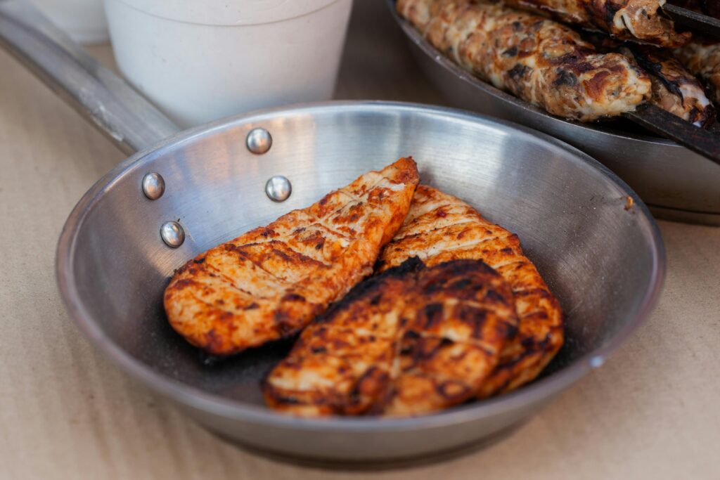 5 Steps Efficient Healthy Meal Planning 9 | eat move healthy Delicious seasoned chicken breasts grilled and served in a stainless steel pan.